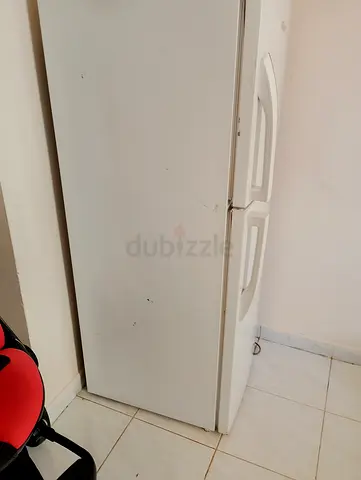 White Double-Door Refrigerator / Freezer - Used some mechanical problem