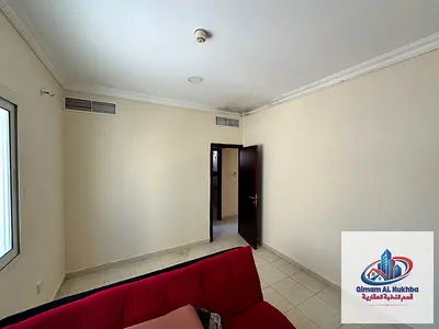 1BR apt in Al Qulaiaa for AED 23k. Features central AC/gas, premium finishes, prime location near services, and flexible payment terms.