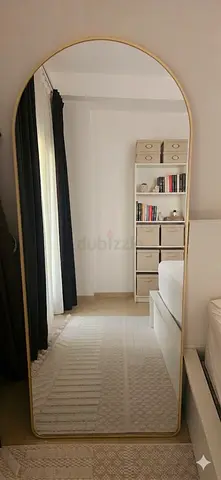 Mirror with gold edging