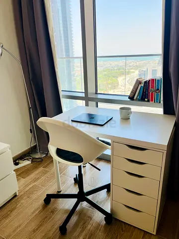 IKEA white desk with 5-drawer unit and swivel chair - good condition