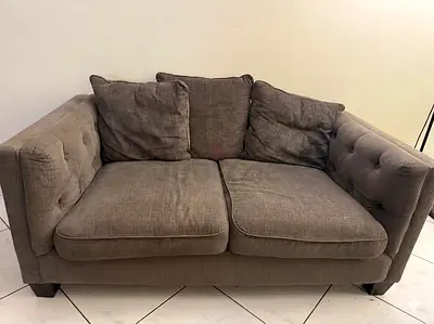 Homes R Us Two Seater Grey Fabric Sofa set of 2