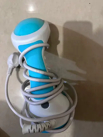 Portable handheld fabric steamer