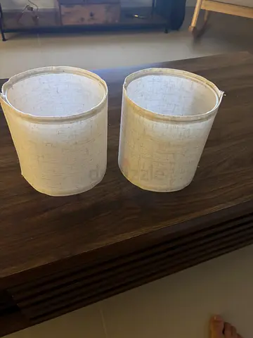 Pair of beige fabric drum lamp shades — good condition