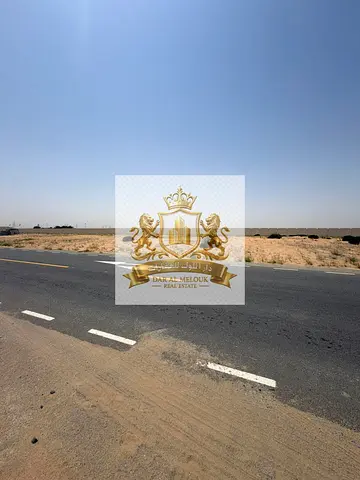 Residential land in the Emirate of Sharjah, Rawdat Al Qurt area, on a main road, area 5166 sq ft