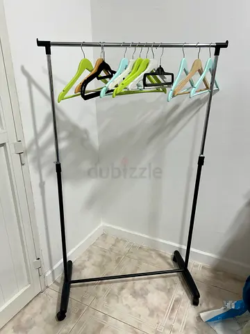 Adjustable Single Rail Clothes Rack with Hangers - Good Condition