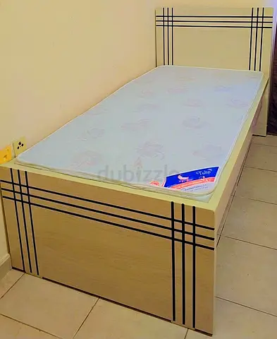 Single wooden bed with mattress - light wood finish