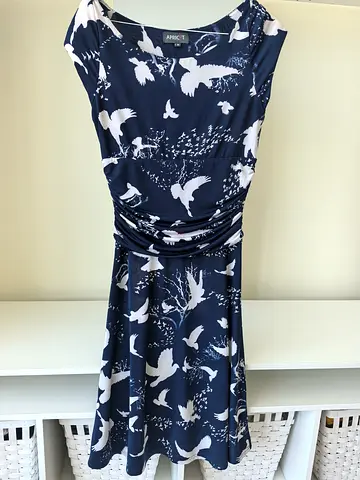 3 dresses. 2 brand new. One worn only a few times
