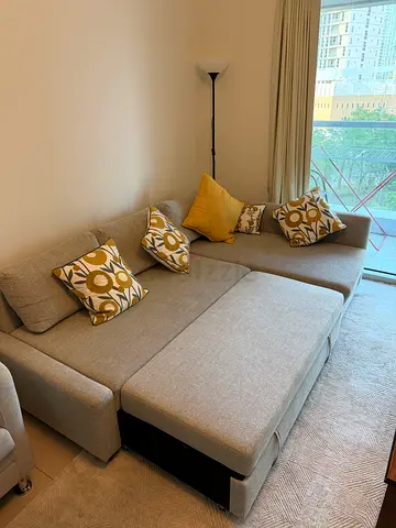 IKEA Light grey 3-seater sofa bed with cushions