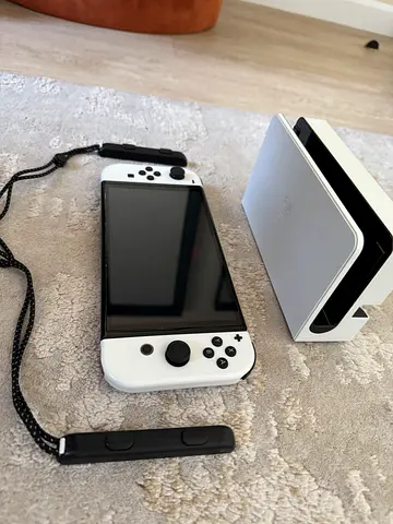 White Nintendo Switch OLED with Dock and Joy-Cons (Good Condition)
