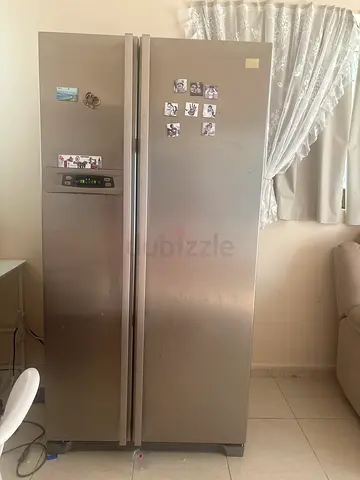 Double door stainless steel refrigerator with good condition is for sale. Urgent!