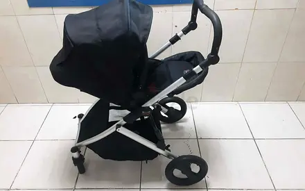 Britax Lightweight 4 wheel baby stroller with canopy and storage basket