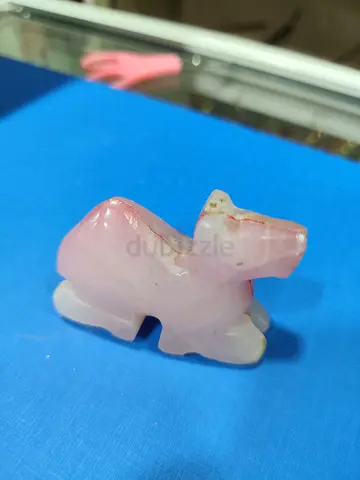 Hand-carved rose marble elephant figurine - small collectible 5 cm