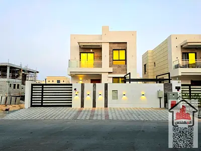 Two-story villa for rent in Ajman, Al Yasmin area. It features three master bedrooms, a majlis (for