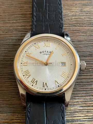 Rotary mens wristwatch with leather strap, working condition