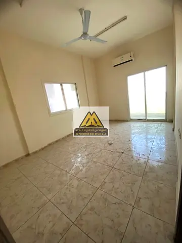 A great opportunity for annual rent in Al Rawda 3, Ajman. This spacious apartment is located on a main road