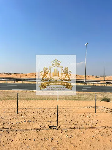 A golden opportunity for investors in the heart of Sharjah - Muzairah 🔥 Commercial land for sale in a strategic location (directly on Street 97) at the entrance to Al Rahmaniyah.