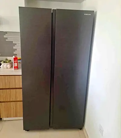 Samsung side by side refrigerator neat and clean perfect working excellent condition