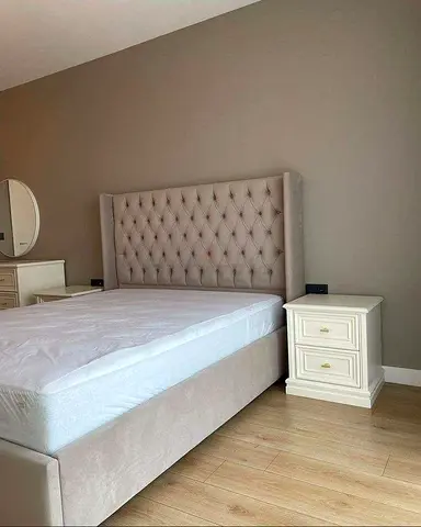 Queen upholstered bed frame with tufted wingback headboard (light beige)