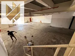 Prime Opportunity in Al Sajaa | Warehouse with Offices, Mezzanine & Modern Fire System on Main R