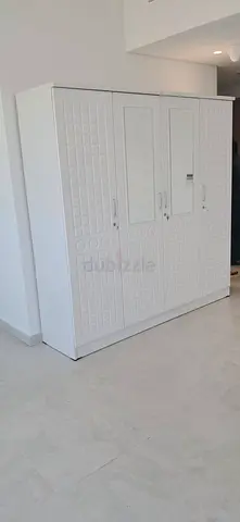 Brand New White 4-Door Wardrobe with Mirror
