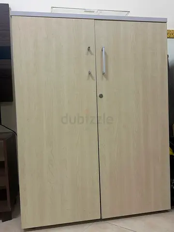 Light wood two-door wardrobe with lock