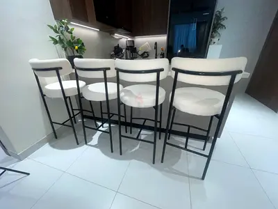 Set of 4 Modern Bar Stools with Cream Upholstery and Black Metal Frame