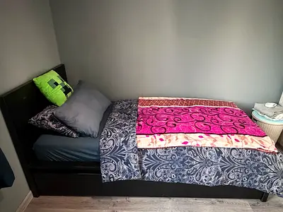 Single black wooden bed with mattress and bedding - great condition