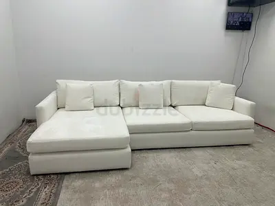 As perfect condition cratebarrel lshape sofa