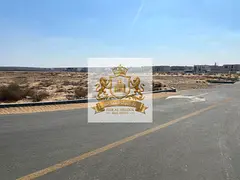 For sale in Sharjah Rawdat Al Qurt area Residential investment plot, 5,200 square feet Very prime lo