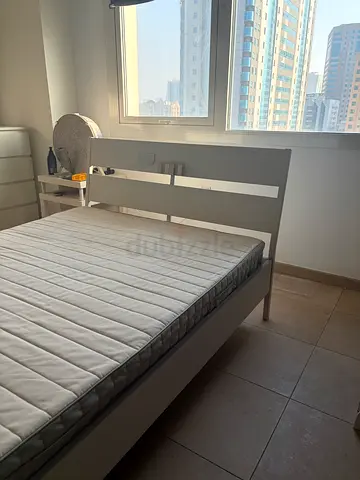 Ikea double bed with mattress — excellent condition