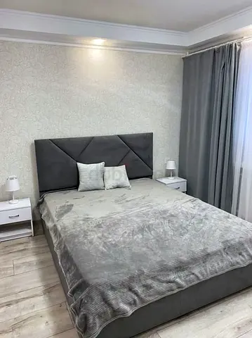 Gray Upholstered Double Bed with Headboard and Base
