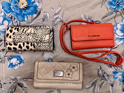 All for 20 AED only 3 pieces branded wallets ITS Guess, Kenneth Cole And Enzo Angiolini Location Al