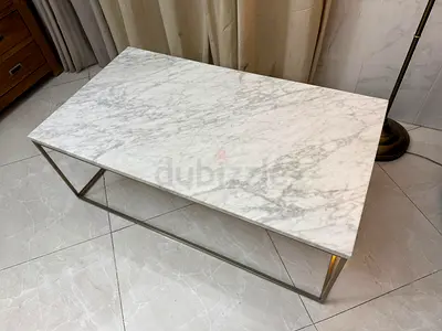 West Elm marble-top coffee table with a gold-finished metal frame