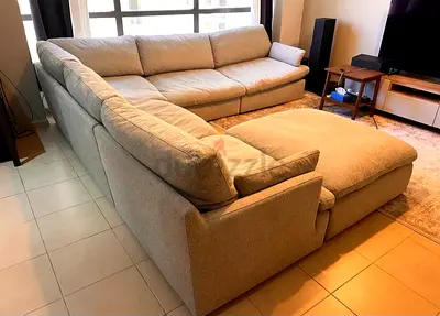 Home Center swin feather filled sofa with footstool