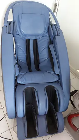 Full-body blue massage chair in good condition