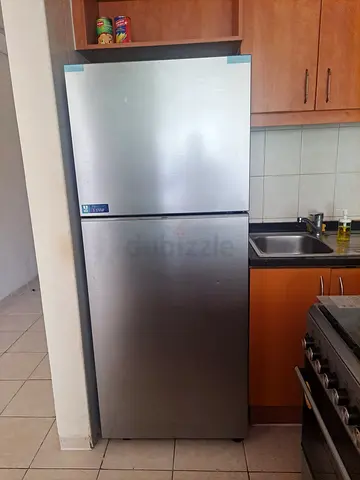Large double-door refrigerator in good working condition