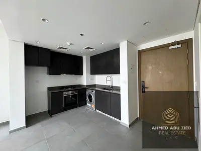 Luxury 2BR apartment in Aljada, Arada. Near Sharjah Airport. Premium finishes, gardens, 3 baths, 3
