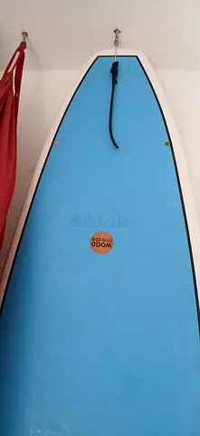 Blue foam wood inside surfboard / beginner stand-up paddleboard
