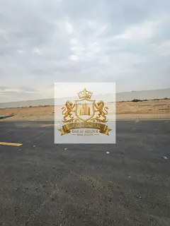 Residential land for sale in a prime strategic location in Al Tayy East, with frontage on two street
