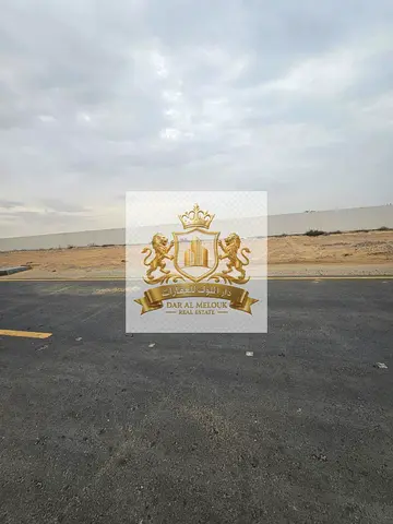 Residential land for sale in a prime strategic location in Al Tayy East, with frontage on two streets (front and back), freehold ownership for all Arab nationalities, on the Dubai border and next to t