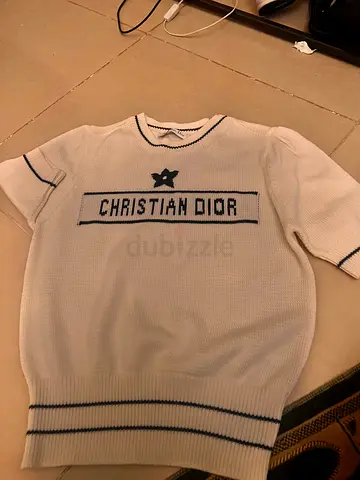 White Christian Dior knit sweater, size unknown, gently used