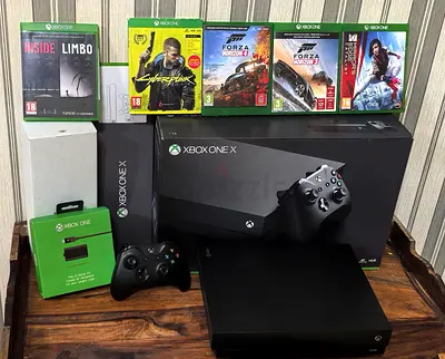 Xbox one X with Original Box Controller games