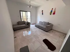 One bedroom and living room - next to the fish market and Mina Street - spacious - balcony - central