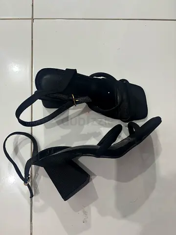 Black block heel sandals with ankle strap