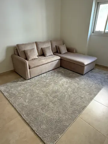 Beige sectional couch