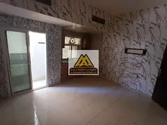 The studio features central AC and free maintenance by the landlord, located near King Faisal Street