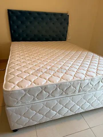 Queen size bed with mattress in excellent condition