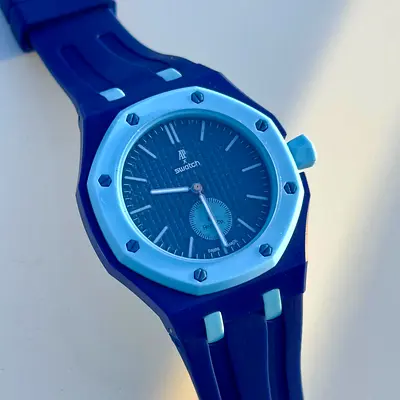 AP x Swatch Royal Pop watch featuring a blue dial with a light blue bezel.
