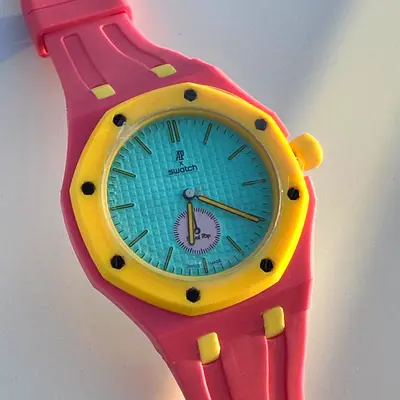 AP x Swatch Royal Pop watch featuring  bezel pink colors