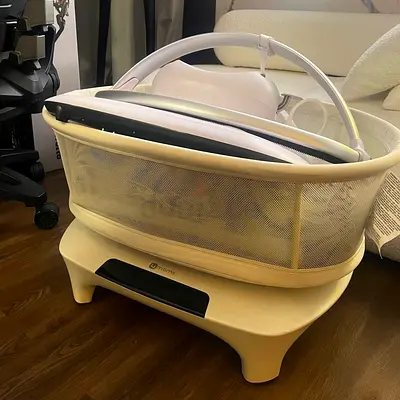 Bedside bassinet with storage stand — good condition